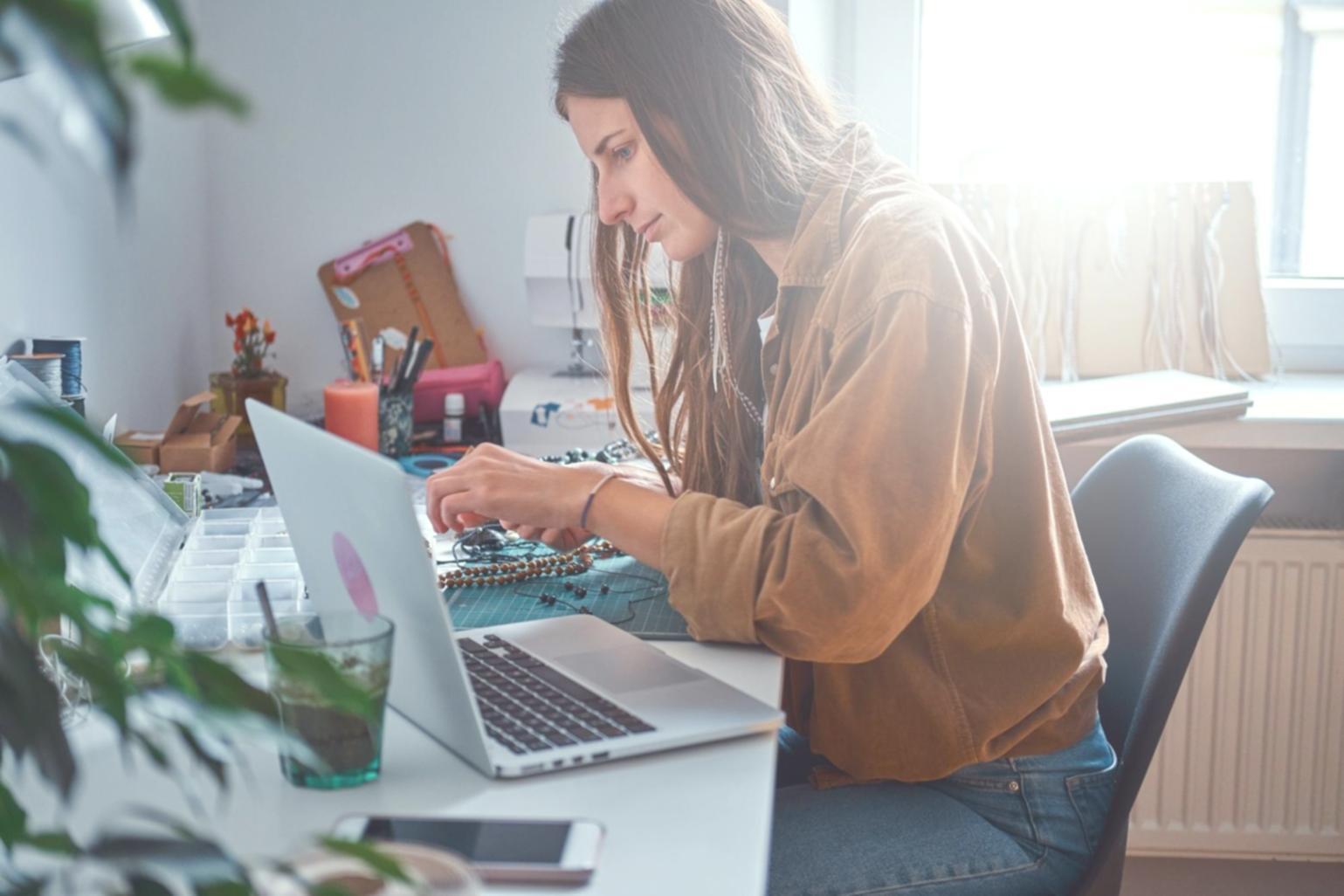 Professional reviewing budget reports and financial metrics